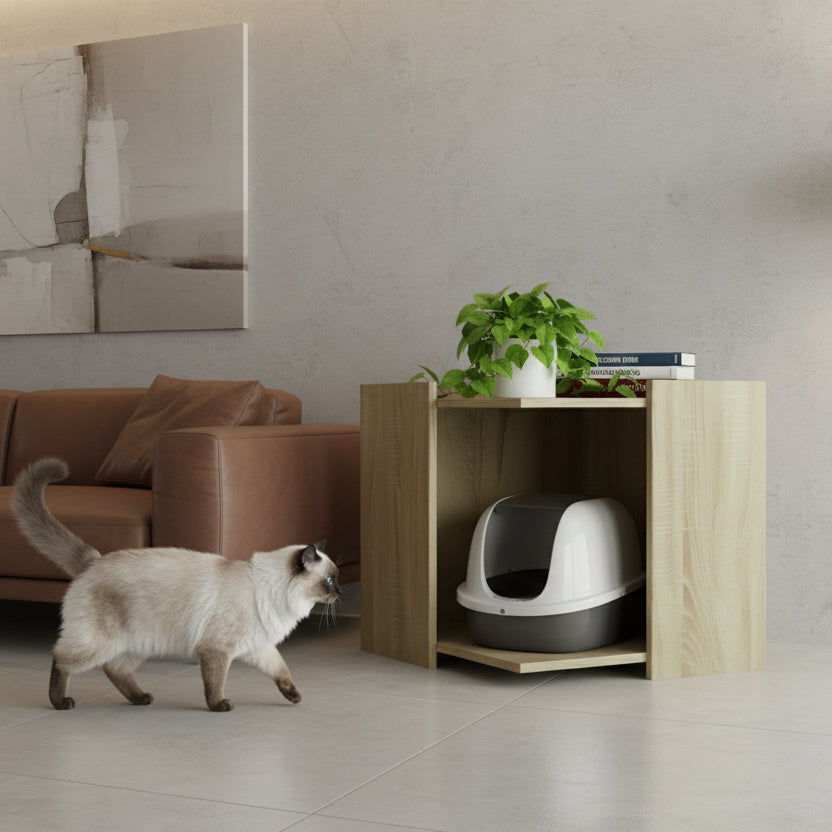Le grand meuble bibliothèque pour chat en bois naturel (53x53x51 cm) intégré dans un salon spacieux. Sa taille de buffet compact permet d'allier décoration d'intérieur et confort félin, cachant avec élégance les accessoires du chat dans un écrin de bois clair et chaleureux, par Palais Félin Paris.