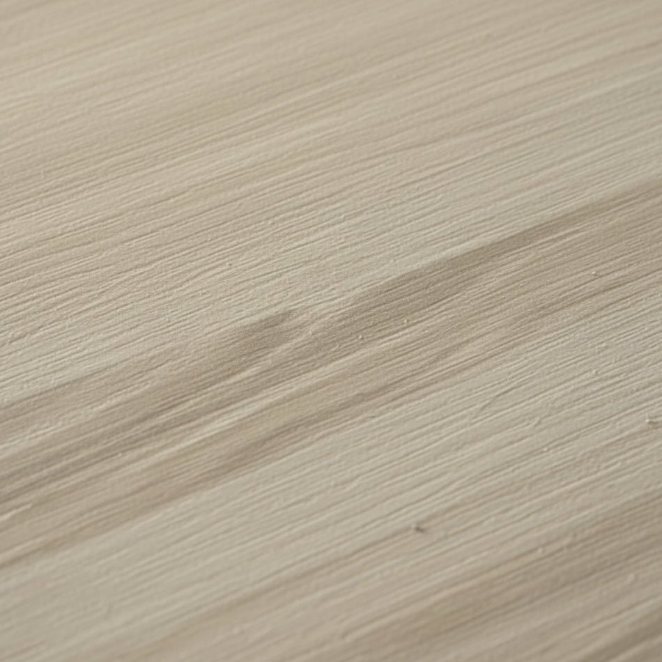 Une prise de vue en gros plan détaillé de la texture boisée du meuble pour chat en chêne sablé. L'image met en valeur le veinage naturel et délicat du bois clair ainsi que la finition mate et haut de gamme du mobilier, signé Palais Félin Paris.